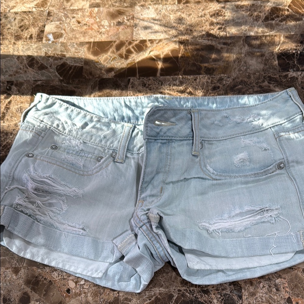 Women's Light Blue Distressed Denim Shorts